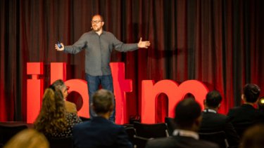 Alistair Turner on stage at IBTM World 2021